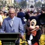 Cast Member Doug Parks as Mickey Mouse standing alongside Roy O. Disney on October 25, 1971.